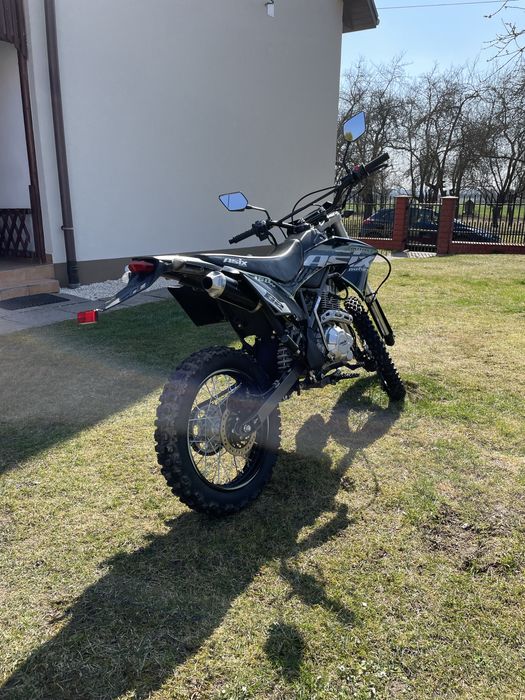 Cross 150cm3 Defender Asix