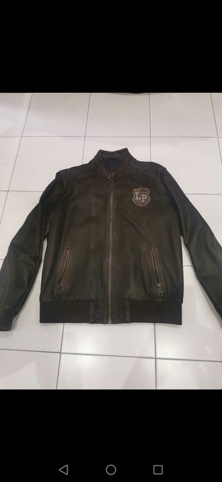 Blusão lion of porches