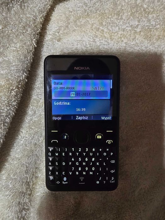 Nokia asha 210 + etuii+ ładowarka stan praktycznie  idealny
