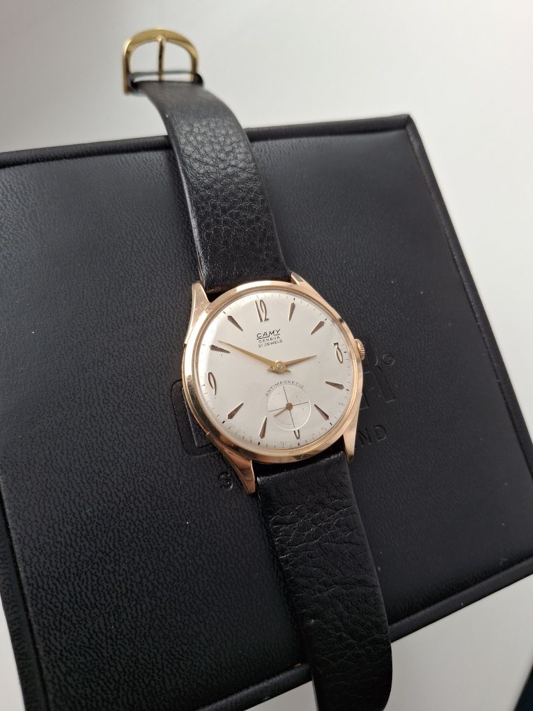 Золотий годинник Camy geneve.