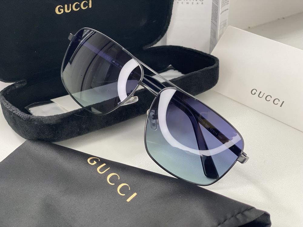 Солнцезащитные очки Gucci.