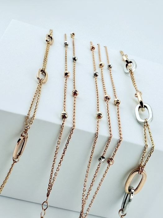 Золоті браслети нові