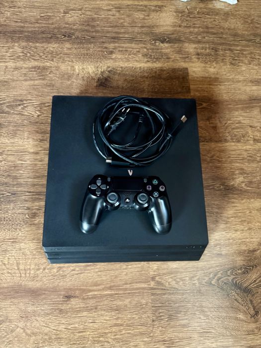 PS4 Pro 1TB z padem