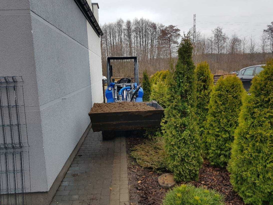 rozwózka ziemii ładowarka,wykopy liniowe, niwelacja terenu,karczowanie