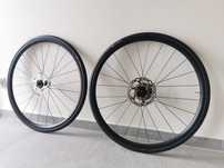 Koła szosowe bontrager paradigm comp TLR + tarcze + kaseta + opony