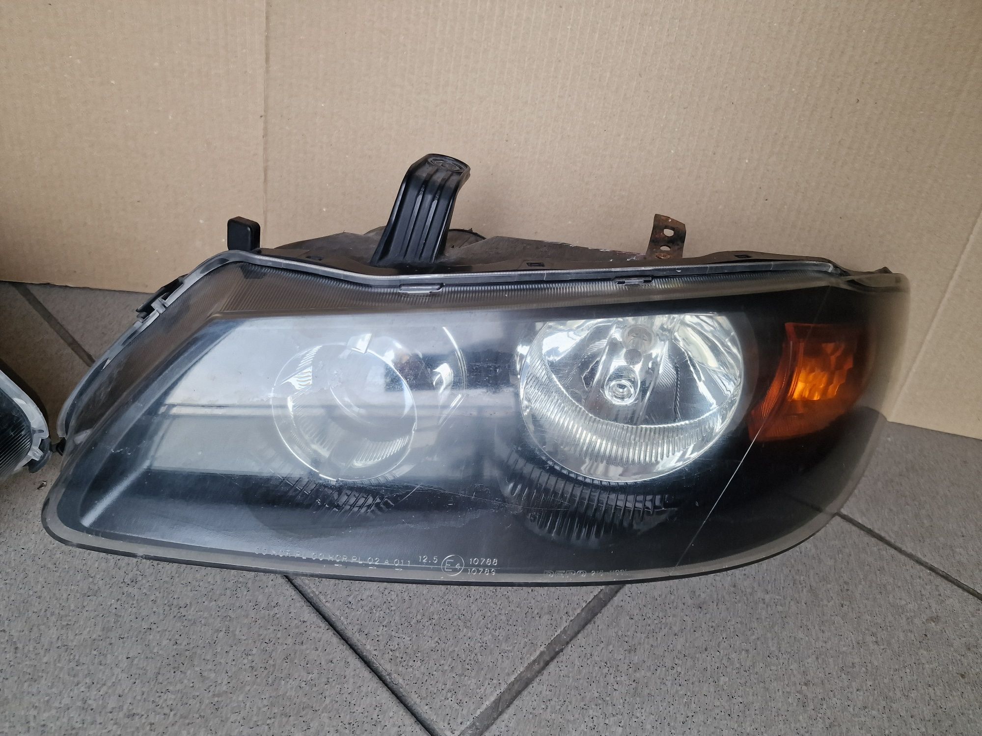 Lampy przód nissan Almera lift N16 komplet