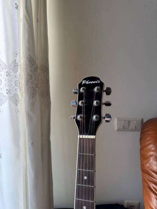 Guitarra acústica phoenix