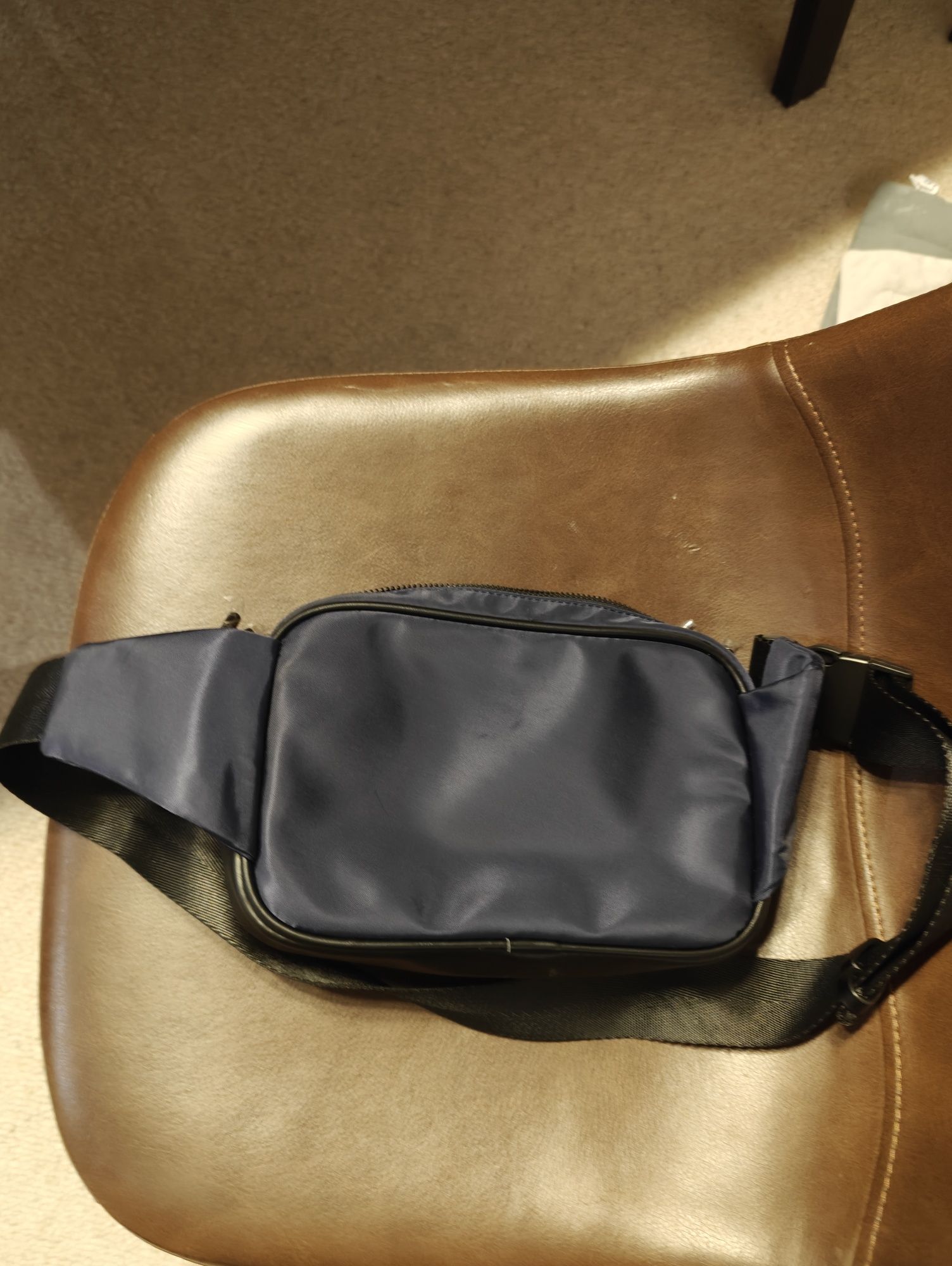 Bolsa cintura nova, na embalagem