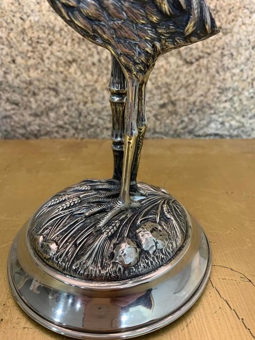 Candeiro em prata com garça
