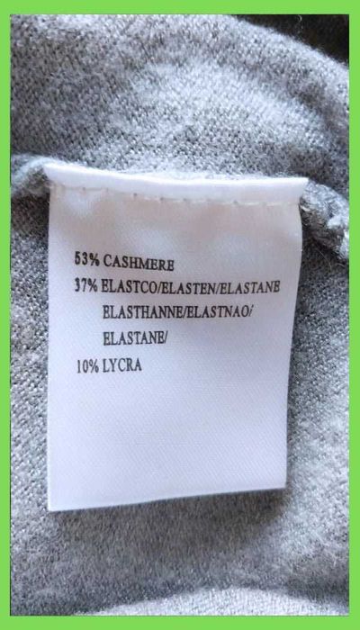 Жіночий сірий светр гольф кашемір р. М
