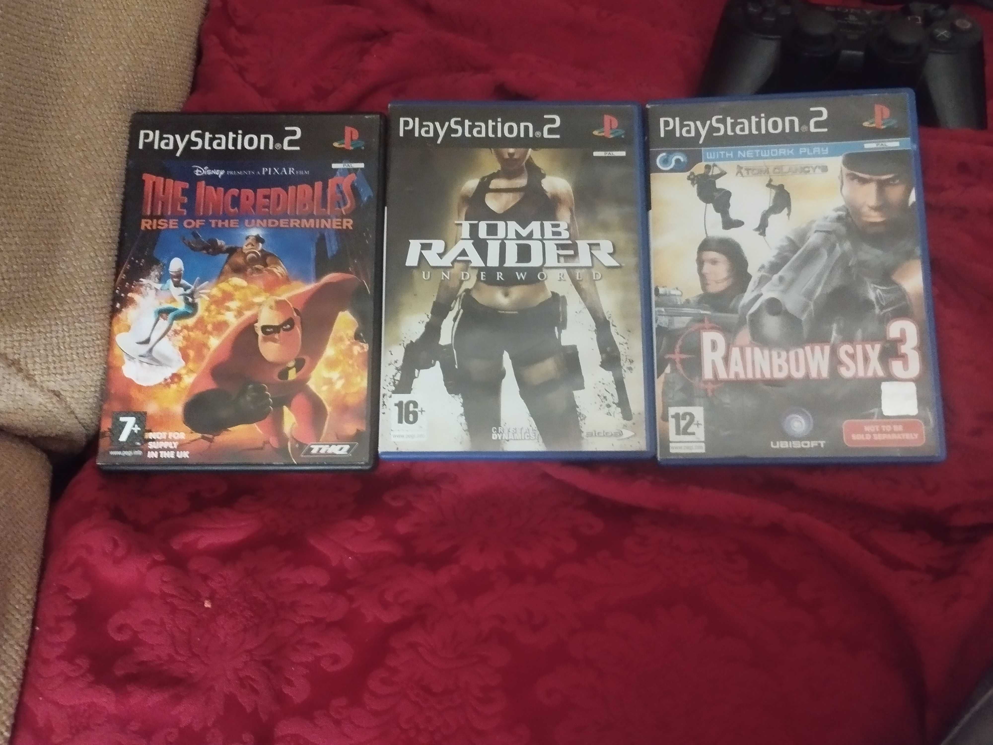 playstation 2 com 2 comandos e 3 jogos