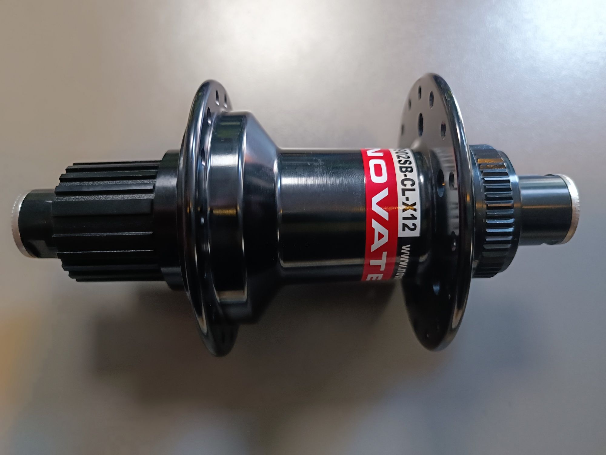 Piasta tył Novatec NT-CLD902SB X12S, 32s, SHINANO MICRO SPLINE, CENTER