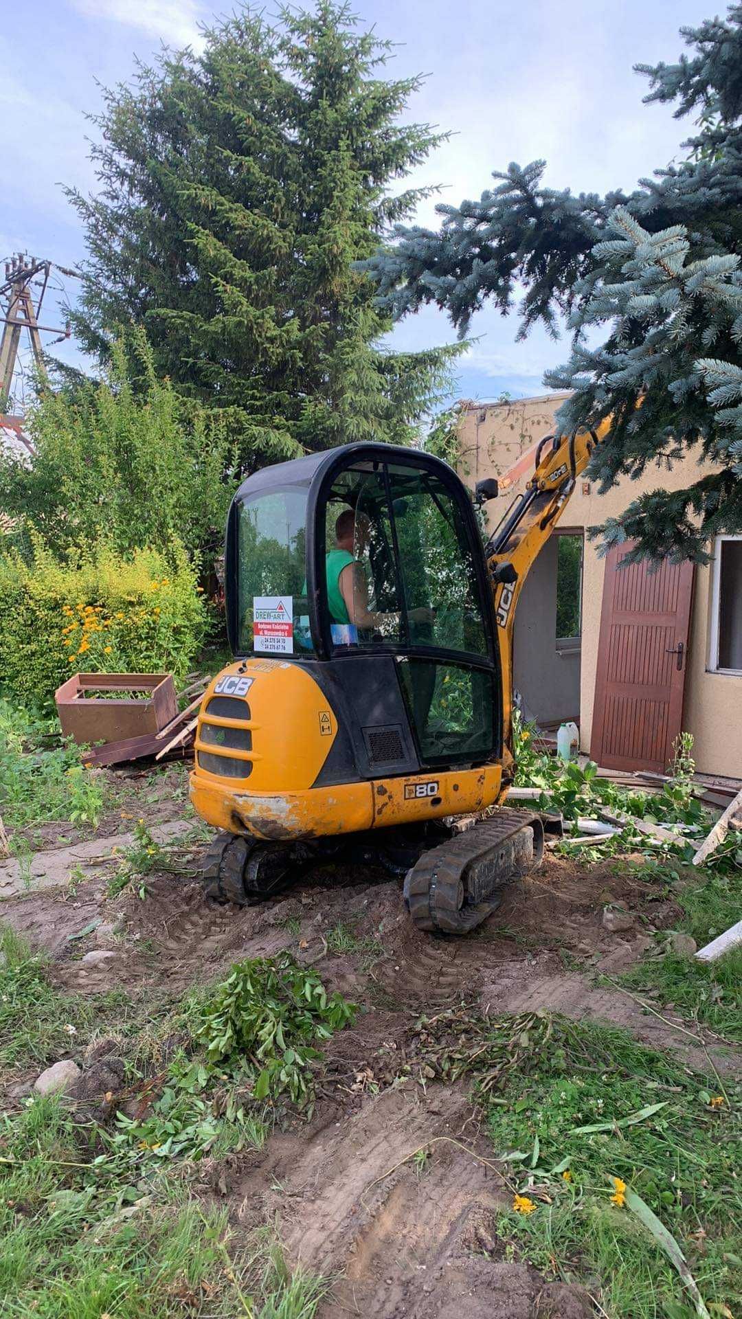 usługi koparką kołową cat M313d roboty ziemne koparka wykopy błotniak