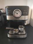 Máquina de café com moedor de grãos