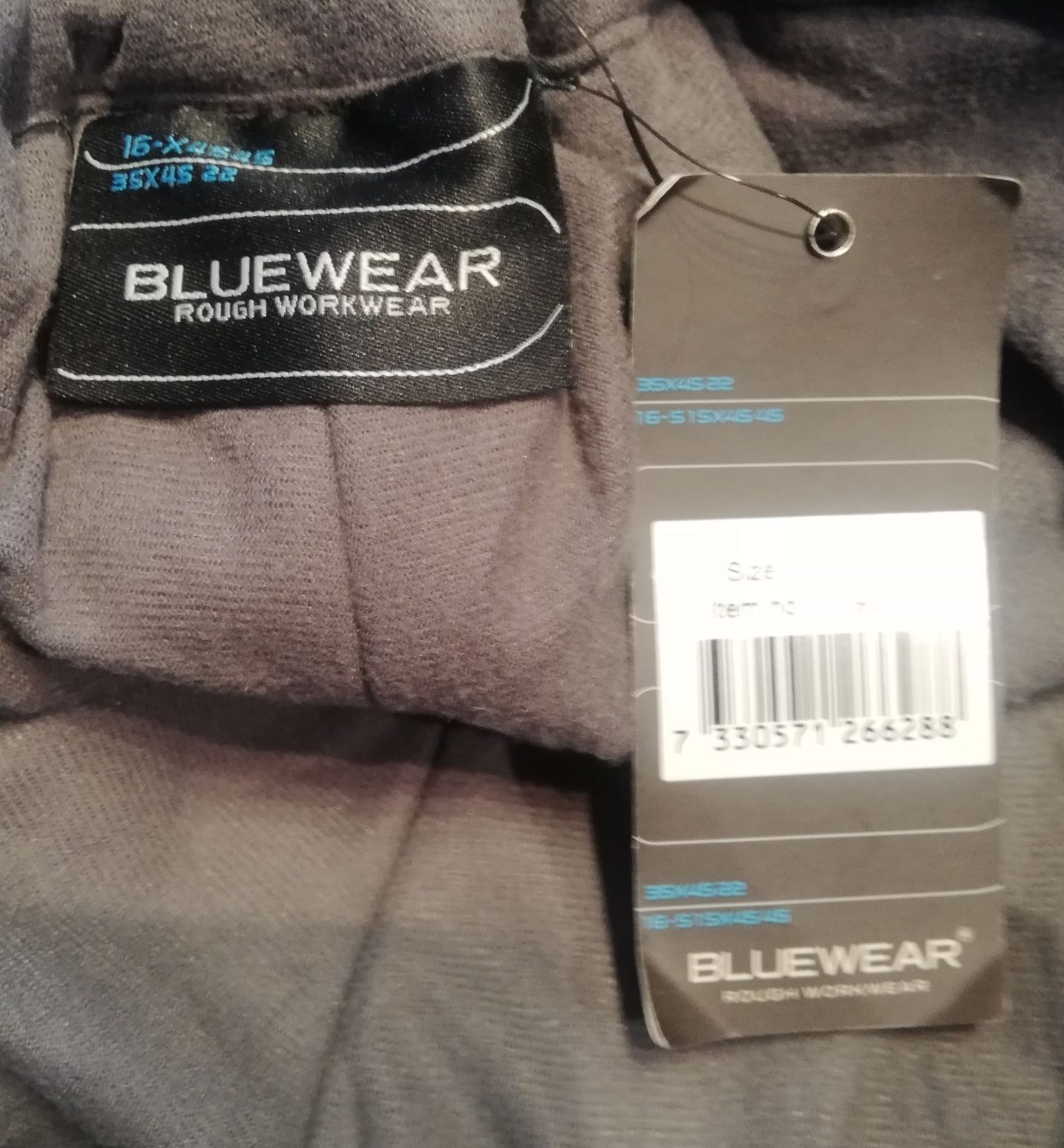 Nowe spodnie ocieplane Bluewear r.L z pasami śniegowymi  i membraną