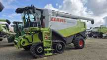 Claas Lexion 600TT z hederem