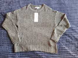 Piękny krótki  sweter z mieniącą nicią