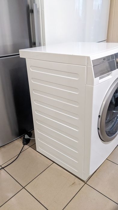 Прально-сушильна машина AEG. L99697HWD