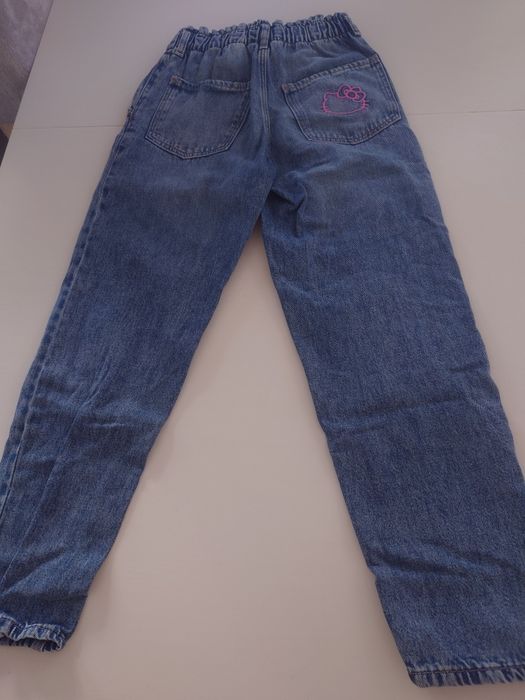 Śliczne spodnie dżinsowe Hello Kity, H&M, r.134