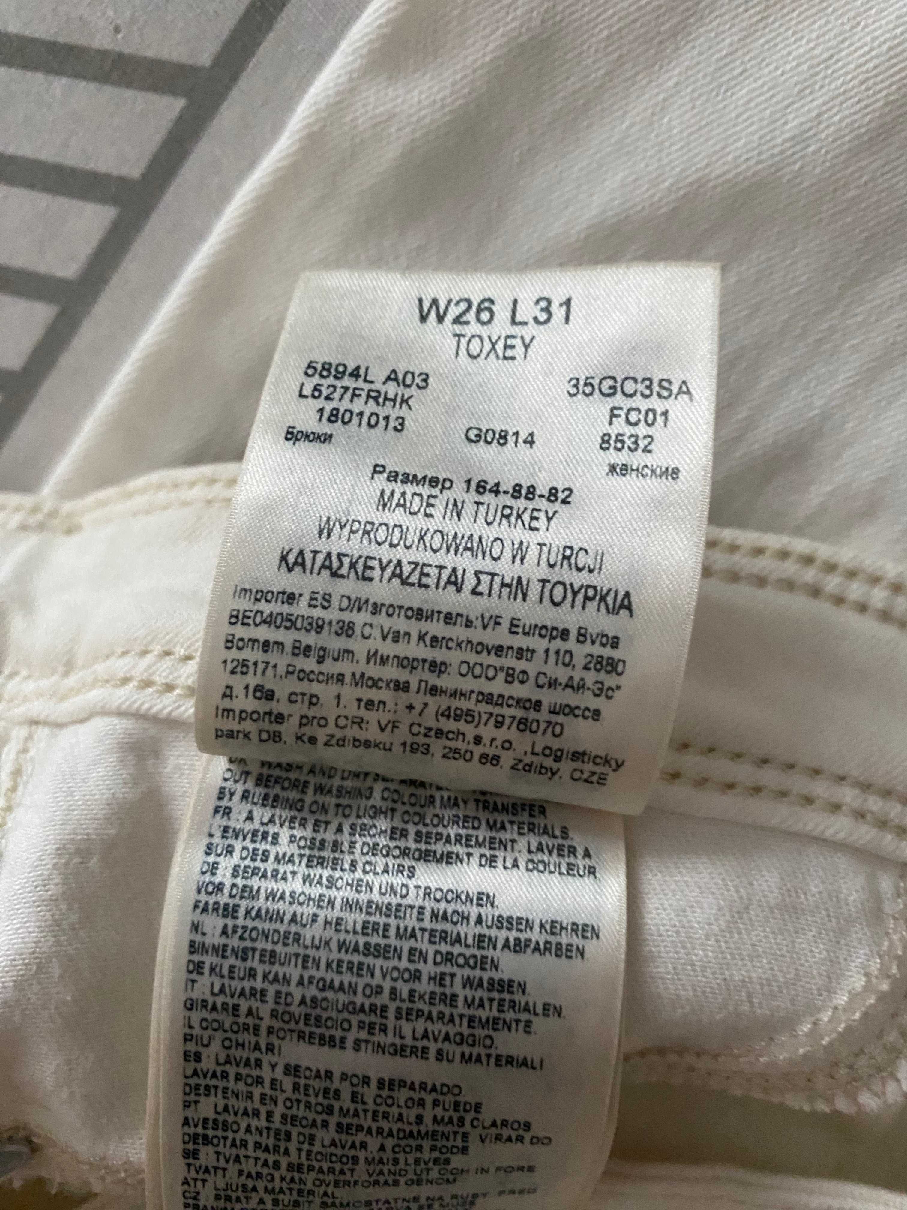 Spodnie damskie białe dżinsowe jeansowe skinny niski stan W26 L 31 Lee