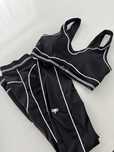 Alo Yoga komplet zestaw top legginsy czarny bialy roz.s/m miu