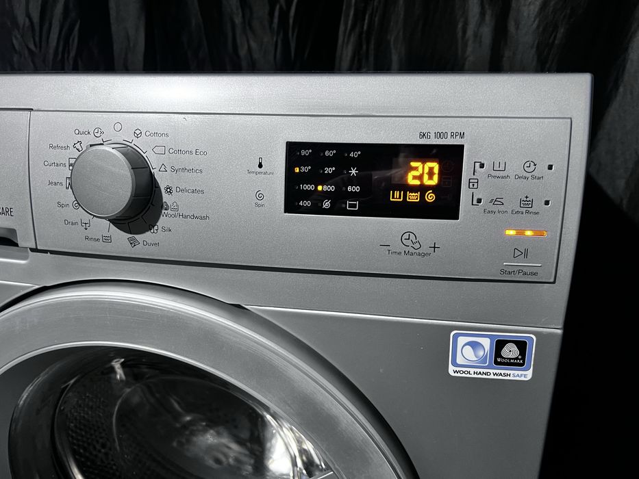 Серебристая стиральная машина Electrolux ews1064. Доставка бесплатно