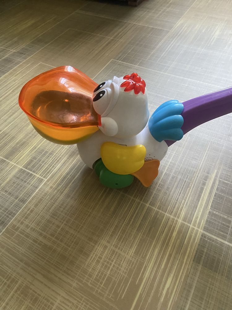 Игрушка пеликан каталка