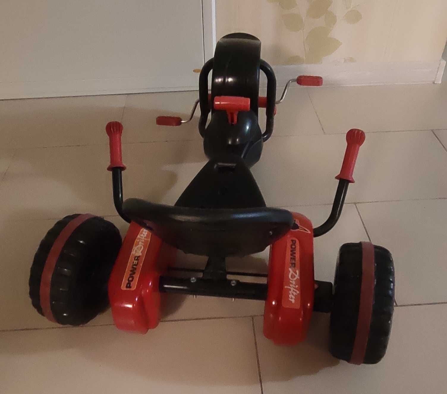 Mały rowerek trójkołowiec dla dziecka gokart