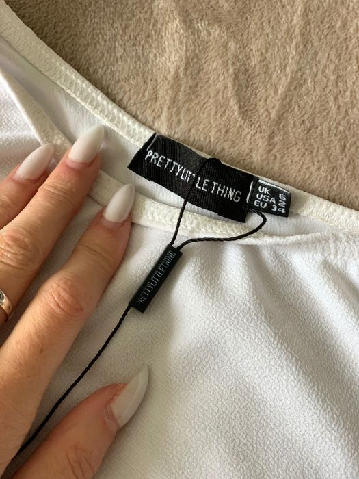 Біла кофта на один рукав