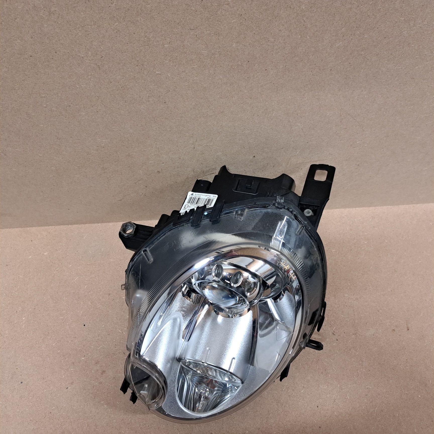 Lampa reflektor bi xenon nieskretny mini Cooper R55 R56 lewy europa