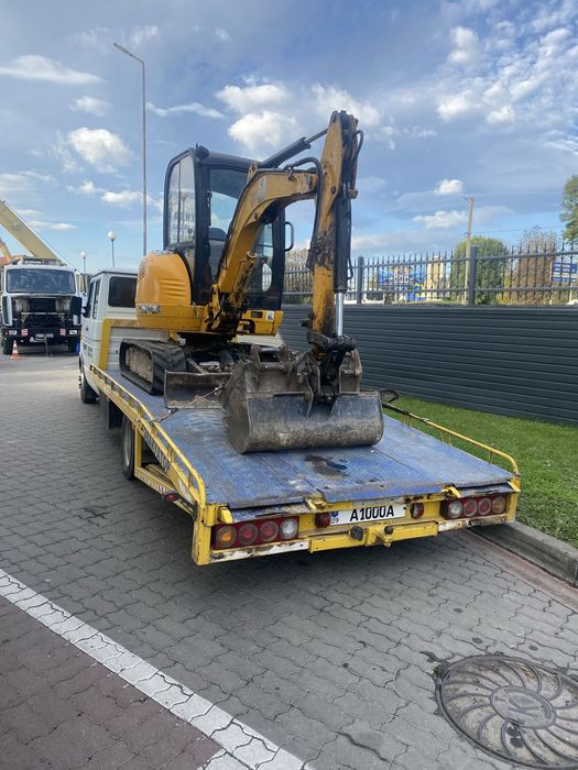 Послуги мініексковатора та евакуатора