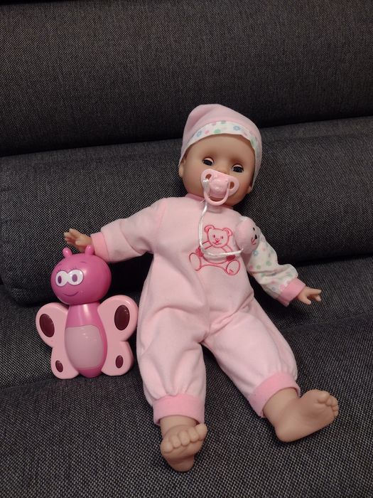 Smiki lalka bobas z grająca pozytywką