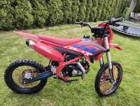 asix lizzard 125 + kask
