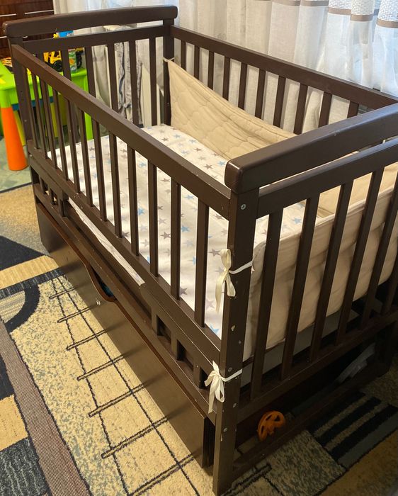 Дитяче ліжко для новонароджених