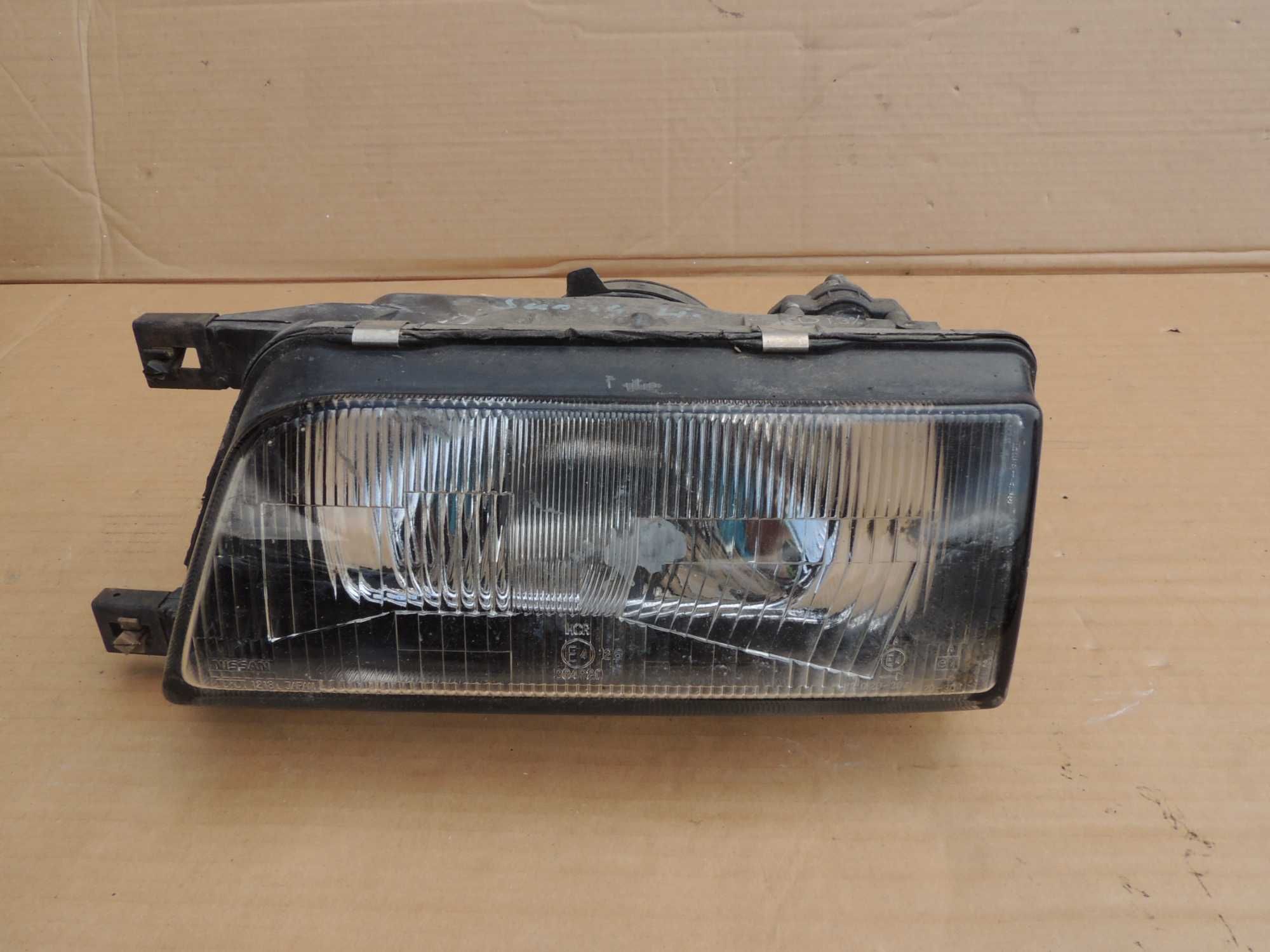 Lampa przednia lewa europejska Nissan Sunny N13 86,87,88,90,91