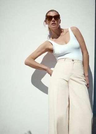 Штани білі кльошні zara