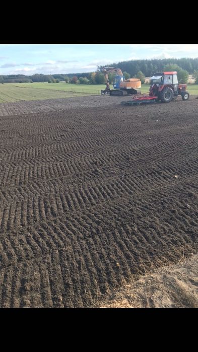 Usługi koparko-ładowarką,koparką kołową,ziemia,piach,wyburzenia