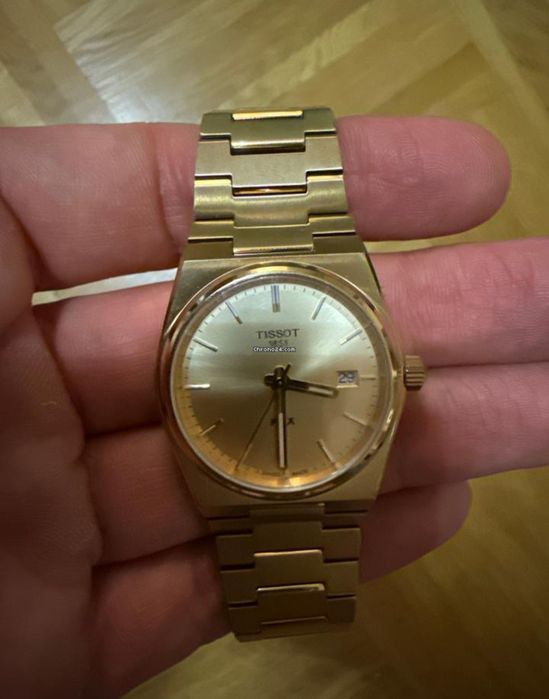 Tissot PRX dourado novo