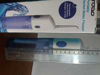 Irrigador dental - usado - portátil