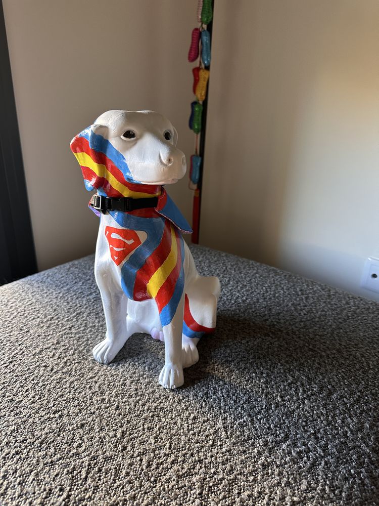 Cão de loiça super homem