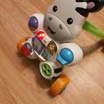 Pchacz Fisher Price jeździk