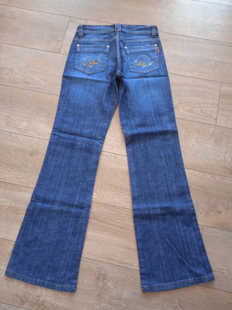 Nowe spodnie jeansy 27