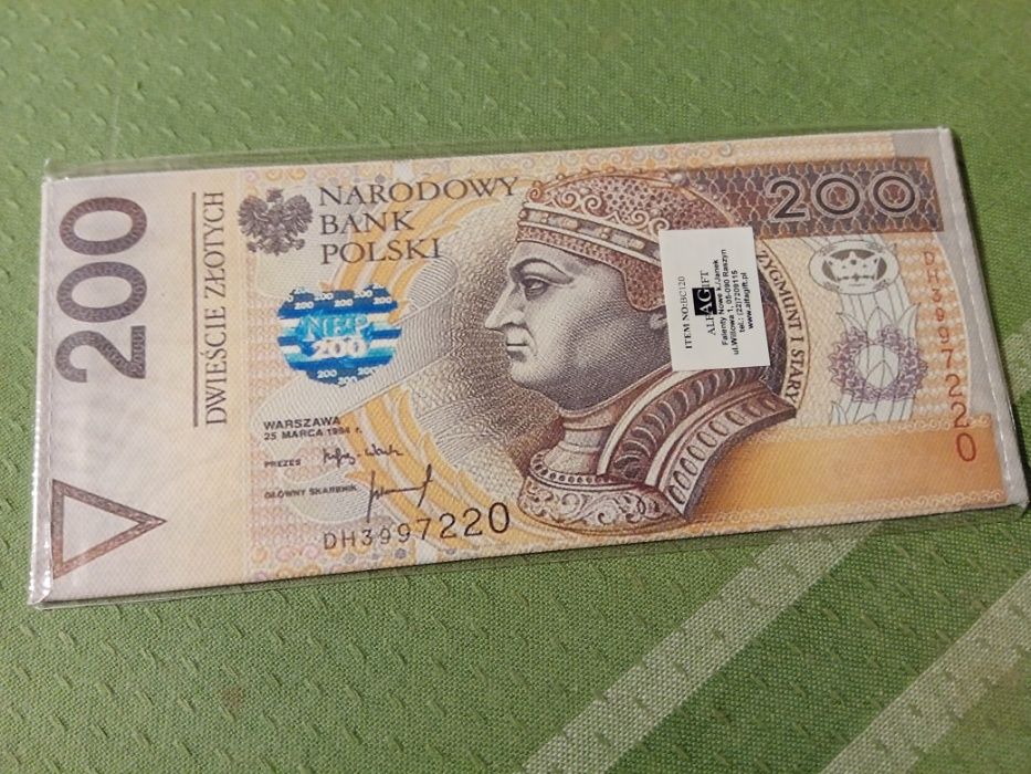 100 zł -portfel/saszetka. Extra gadżet.