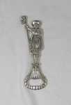 Saca-caricas ornamentado.