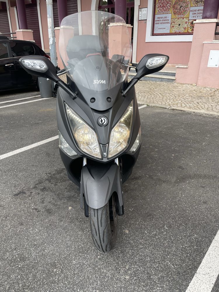 Sym 125 i gts  o motor parece um relogio ideal