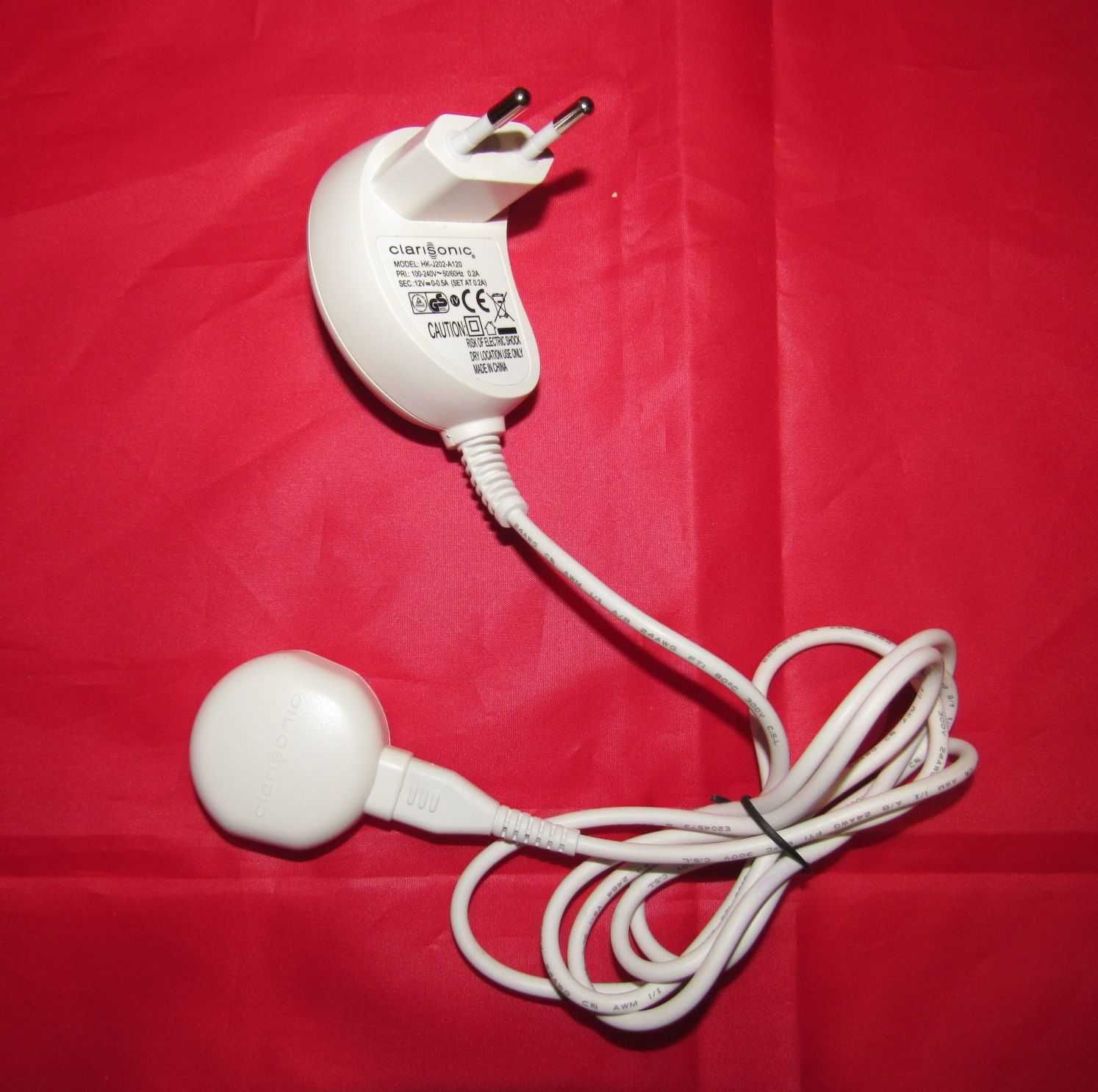 Clarisonic HK-J202-A120 - беспроводная зарядка, адаптер, блок питания.