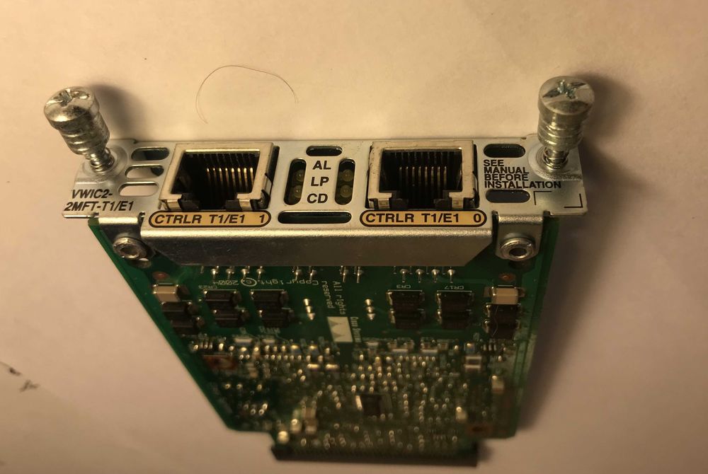 Модуль Cisco VWIC2-2FMT-T1/E1.