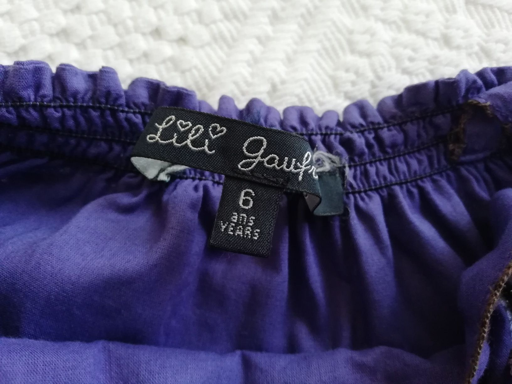 Vestido de menina Lili Graufet roxo bordado no peito com pompons