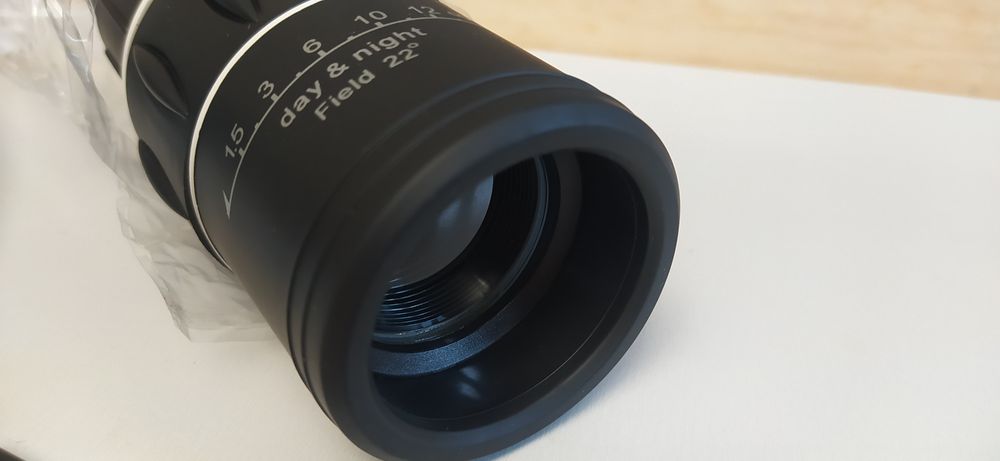 Монокуляр 10х42 з регульованим фокусом  та окуляром