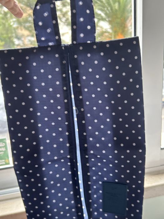 Necessaire + saco de sapatos.